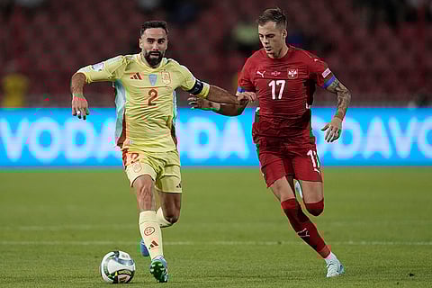 2024-25 Nations League Football Serbia vs Spain: Spain's Dani Carvajal challenges for the ball with Serbia's Ivan Ilic